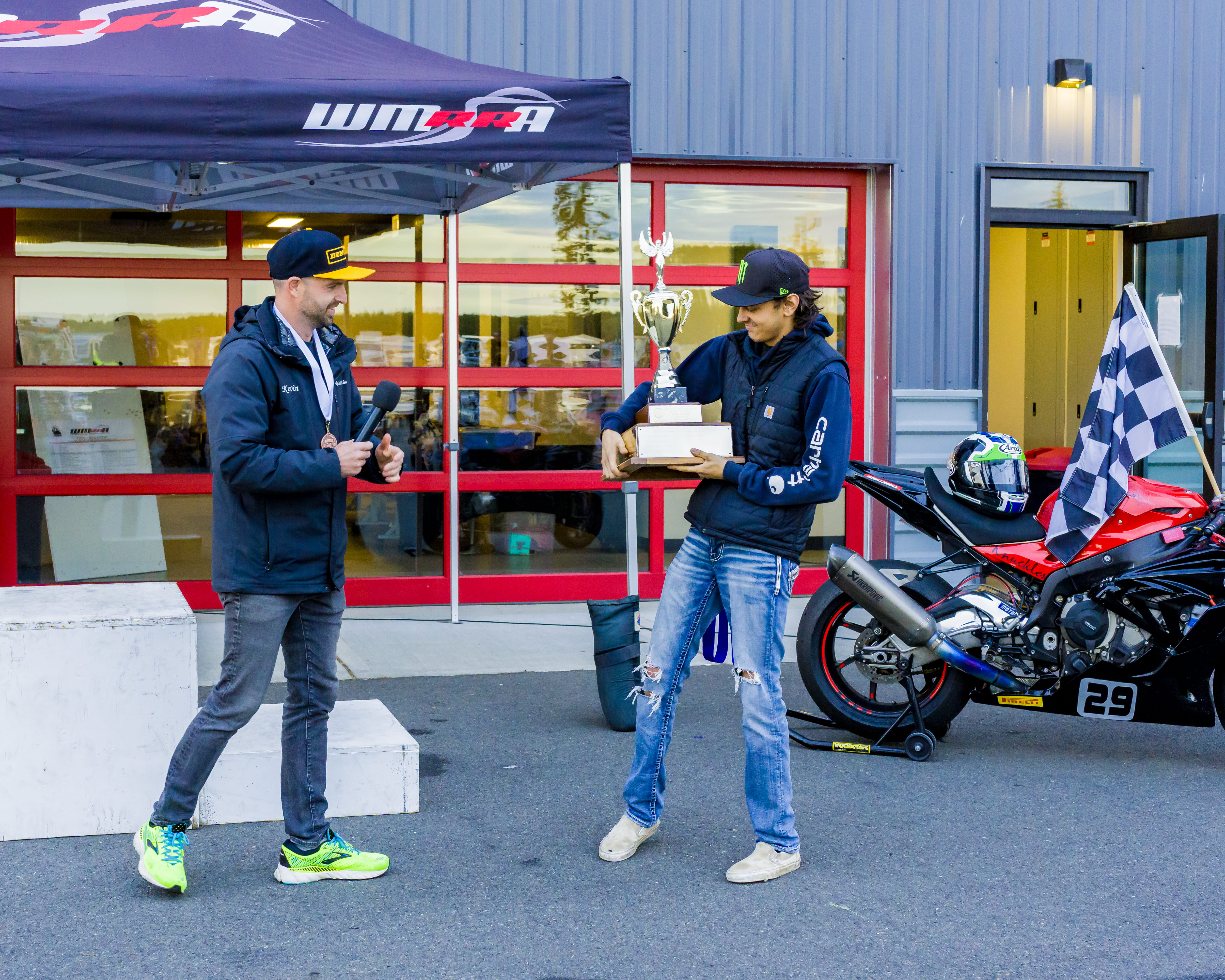 WMRRA champion recieving a large trophy